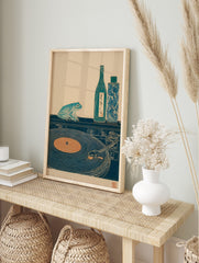 Japanese woodblock style print of a teal frog, sake bottle, and record player on a dark, in an alternate framed mockup