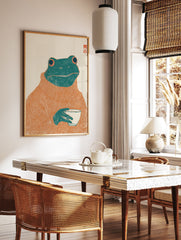 Whimsical frog art print featuring a green frog wearing an orange turtleneck sweater and holding a white cup on an off-white background. - Image 2