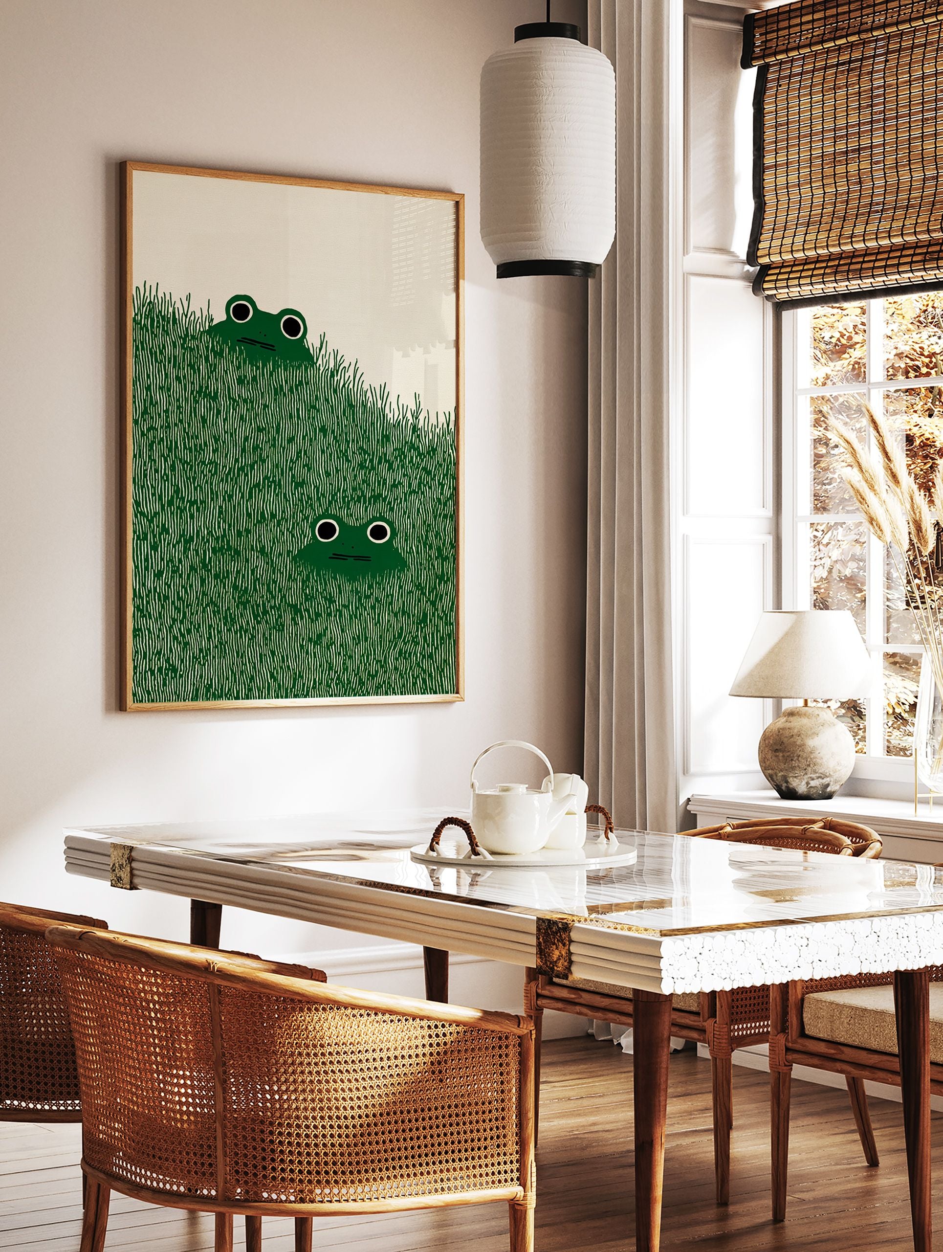 Illustrated frog art print with two green frogs peeking from tall green grass against a cream background. - Image 2