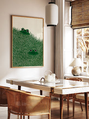 Illustrated frog art print with two green frogs peeking from tall green grass against a cream background. - Image 2