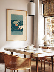 Illustrative frog DJ wall art on a turntable with a vinyl record and human hand, in a styled room mockup