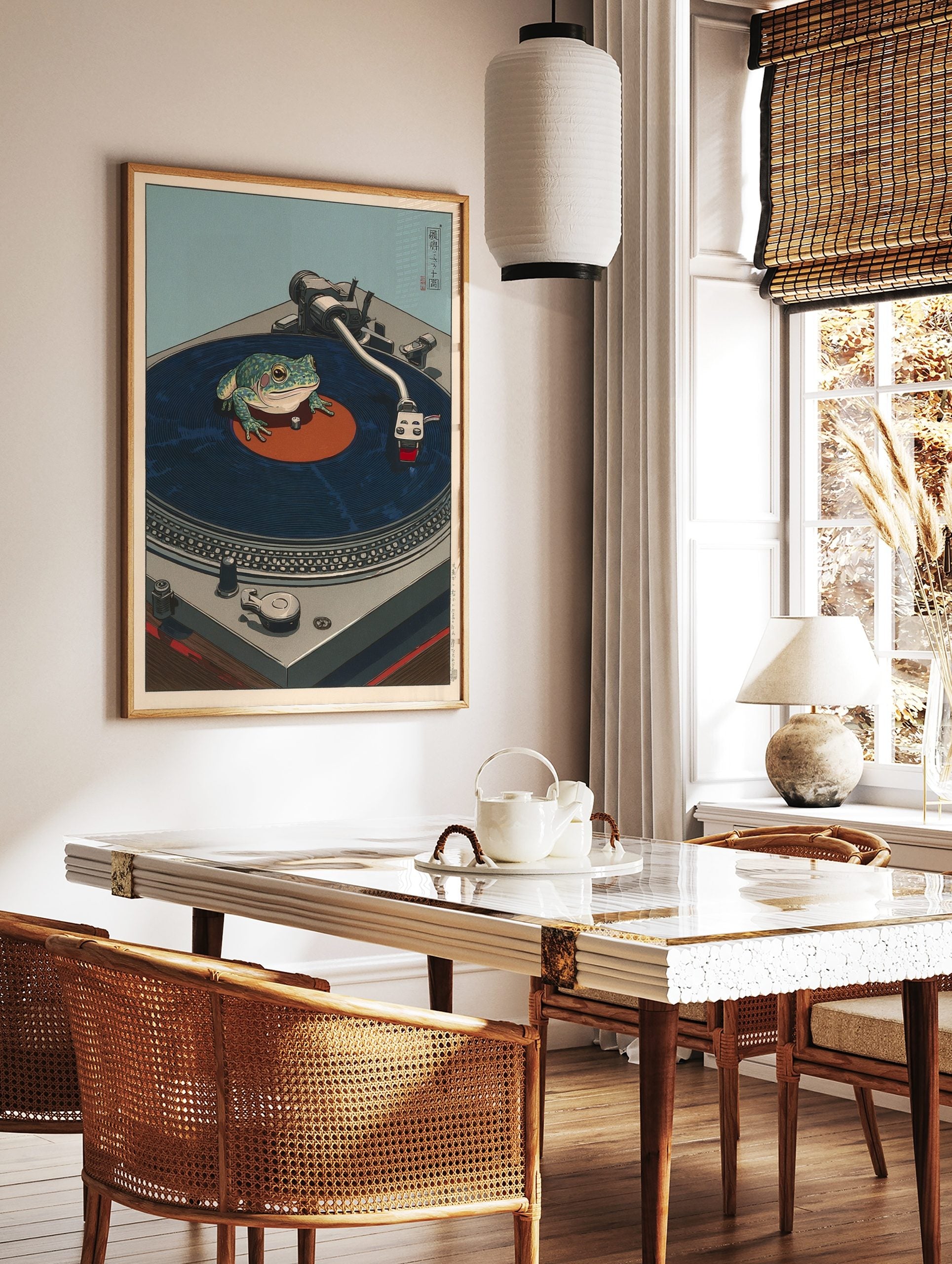 Ukiyo-e style art print of a green frog on a dark blue vinyl record on a grey turntable, with, in a styled room mockup