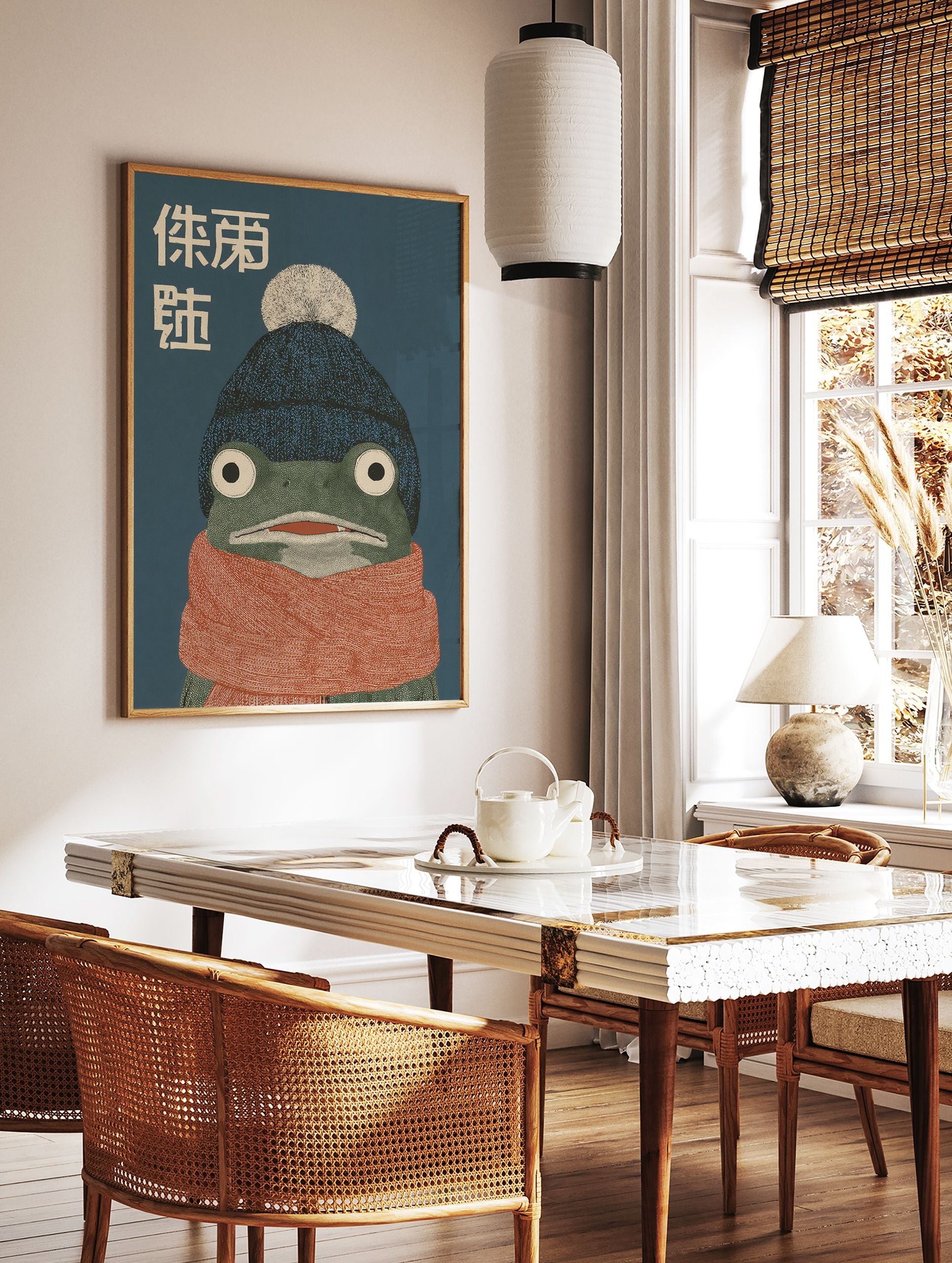 Illustrative frog wall art wearing a blue beanie and orange scarf with Japanese text on a dark blue background, cozy animal print. - Image 2