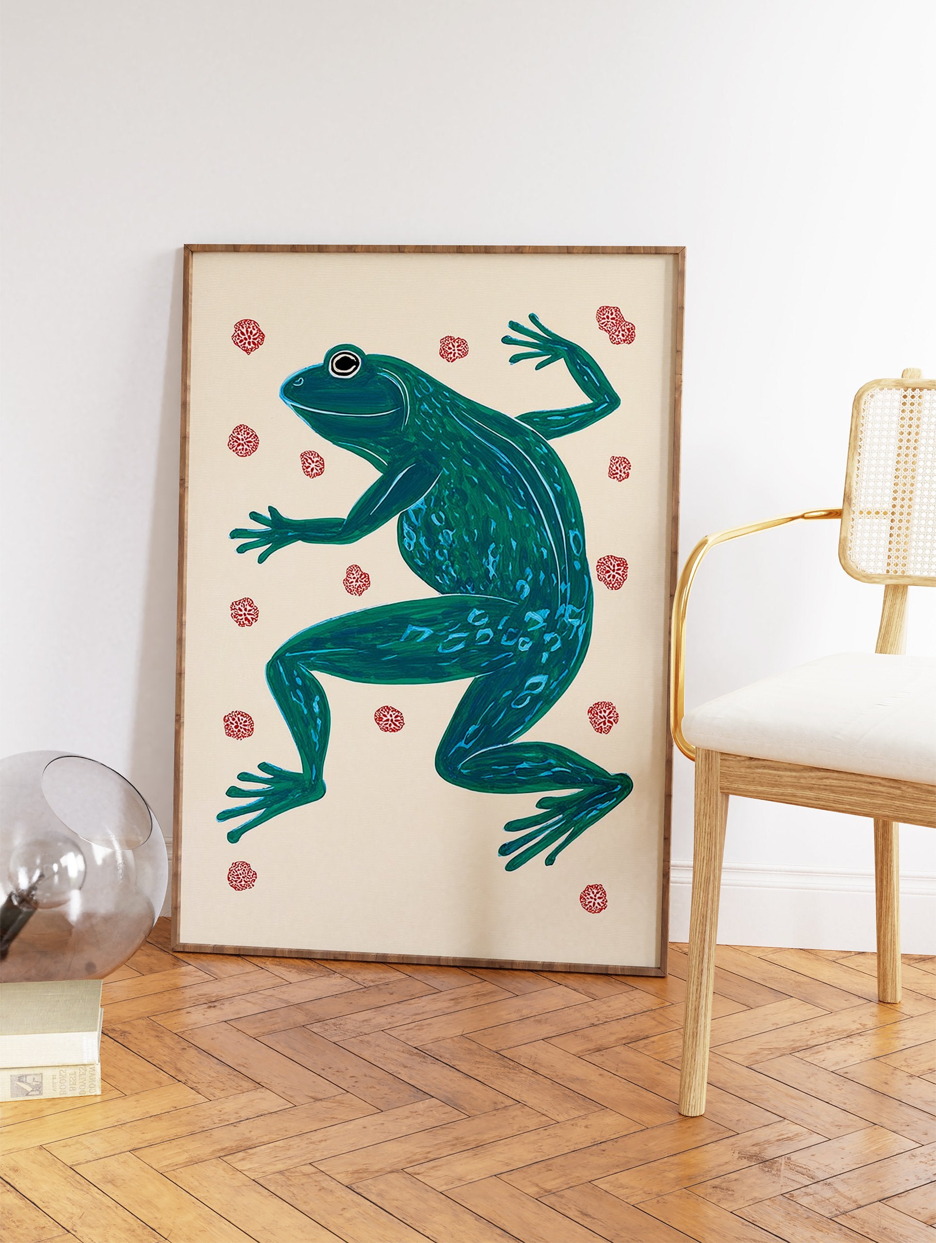 Vibrant green illustrated frog wall art print on a light beige background with small red floral patterns. - Image 2