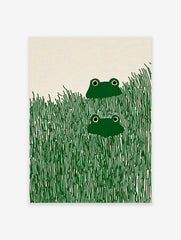 Illustrative frog wall art print featuring two green frogs with black eyes peeking from tall dark green grass.