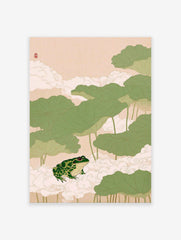 Japanese frog wall art print with a green frog on white clouds surrounded by large green lotus leaves on a light pink background.