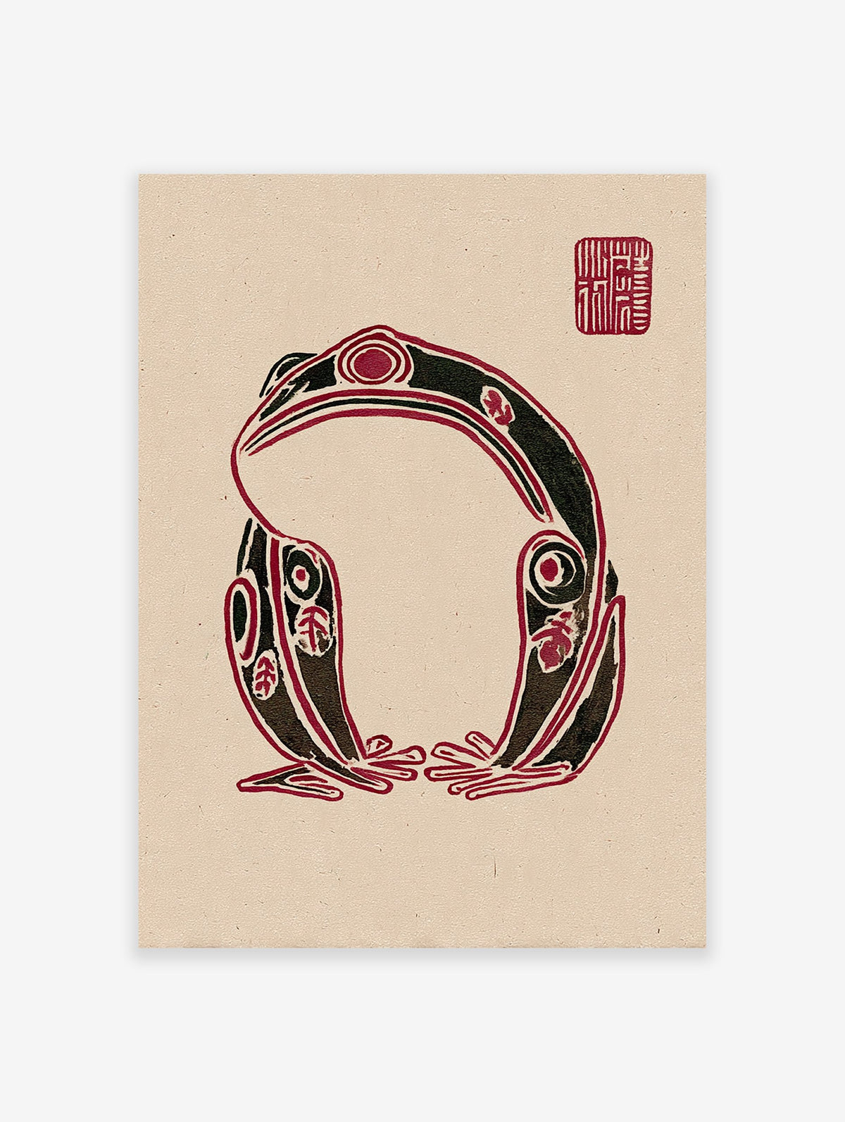 Stylized black and red frog wall art print in an indigenous folk art style on a beige background with a red seal.
