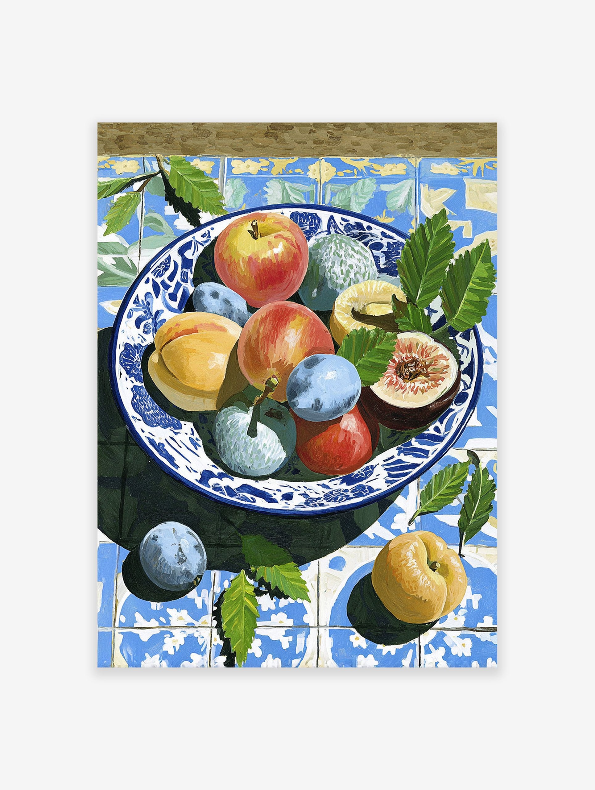 Colorful fruit still life painting in a blue and white bowl on patterned Mediterranean tiles with green leaves.
