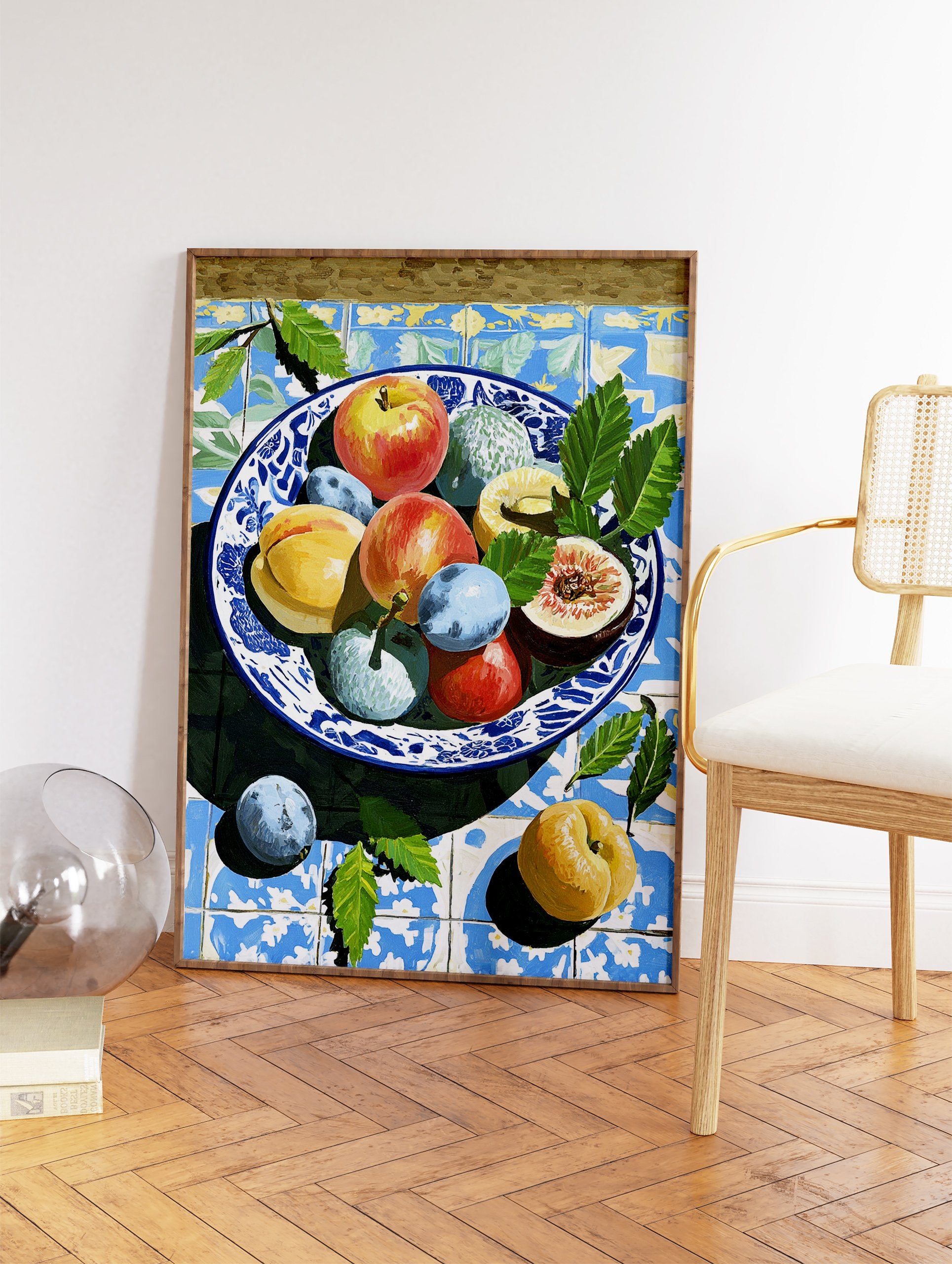 Colorful fruit still life painting in a blue and white bowl on patterned Mediterranean tiles with green leaves. - Image 2