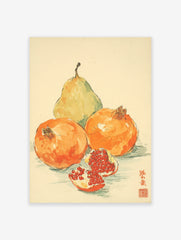 Watercolor fruit wall art showing a green pear and two orange pomegranates, one cut open, with Japanese calligraphy.