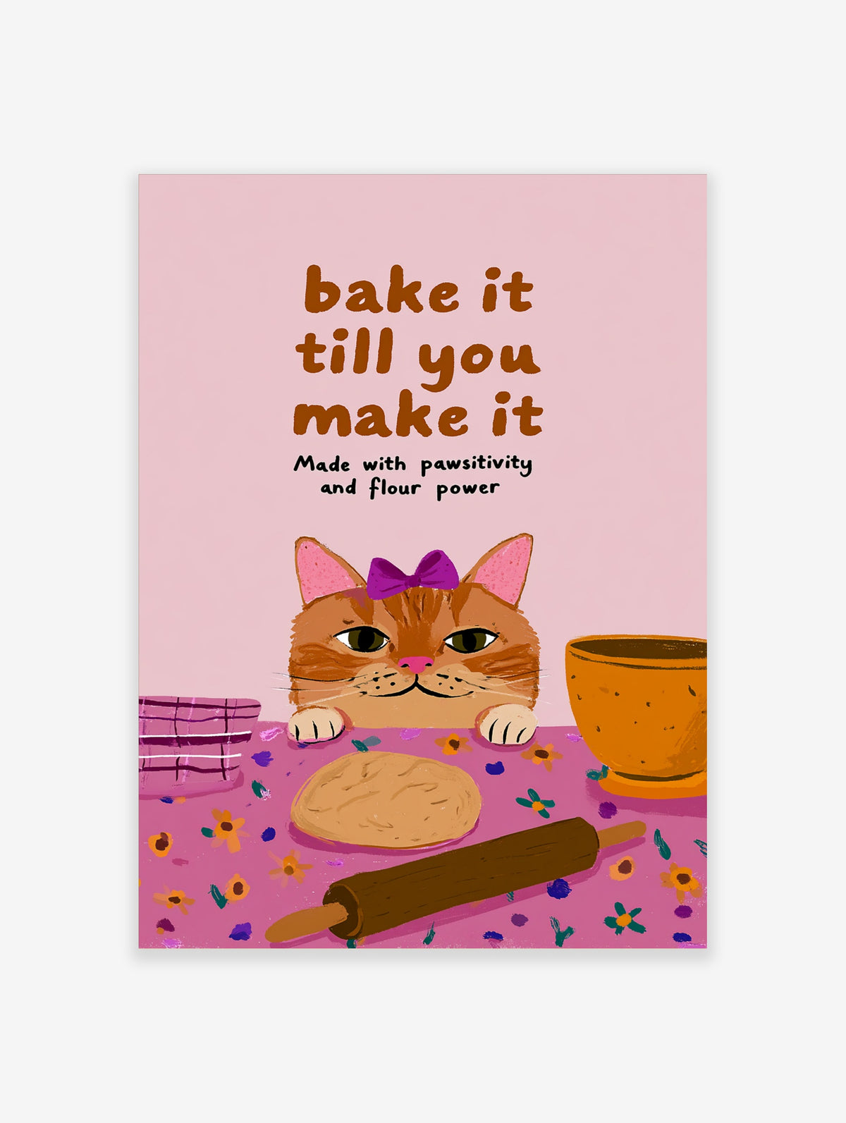 Ginger cat in purple bow with paws on table beside dough and rolling pin, pink baking poster