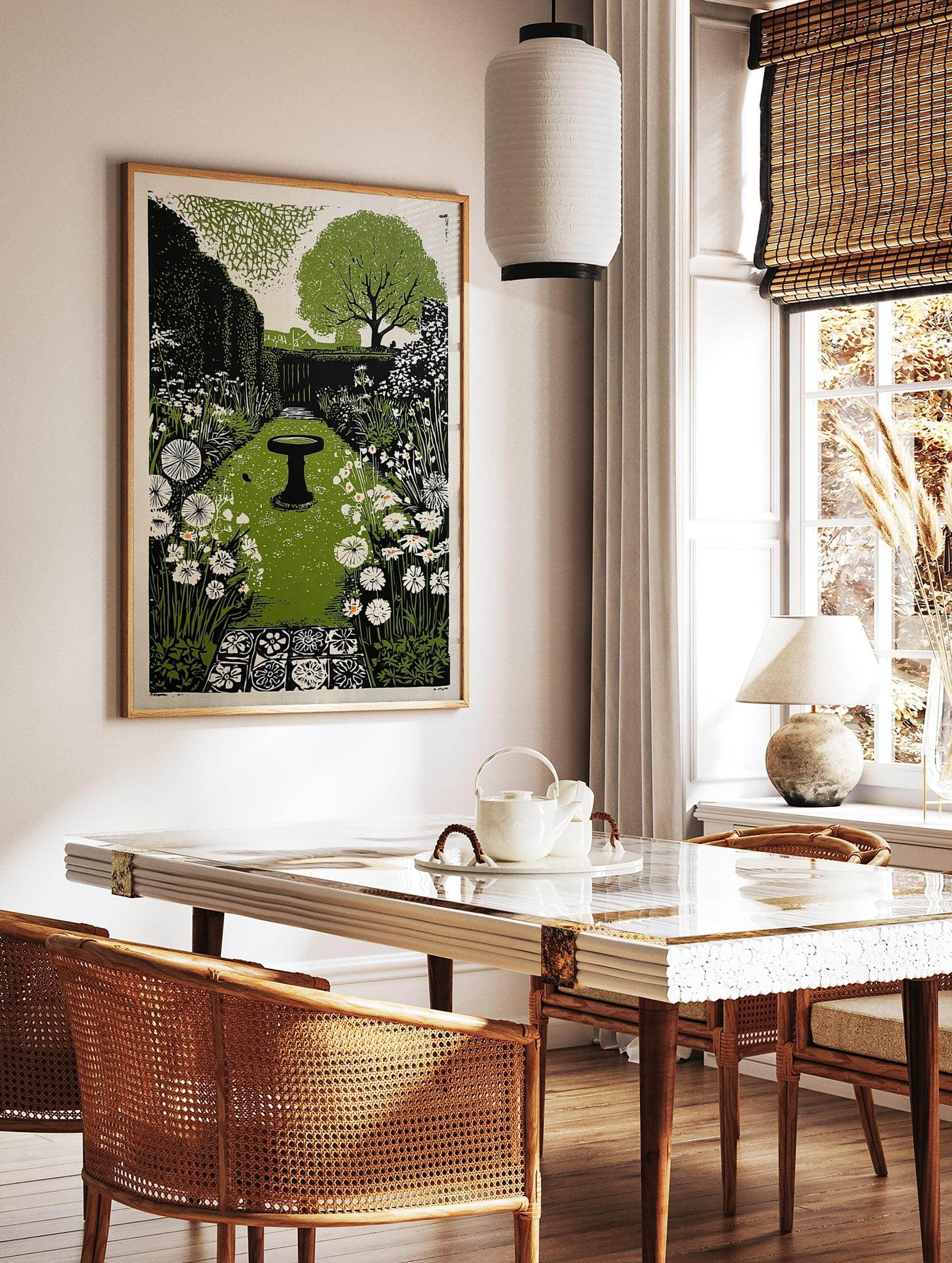 Illustrative garden print with central bird bath, green path, white flowers, and hedgerows, in a styled room mockup