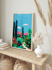 Vibrant garden wall art painting featuring tall trees, green bushes, red flowers, and pink mountains under a blue sky. - Image 3