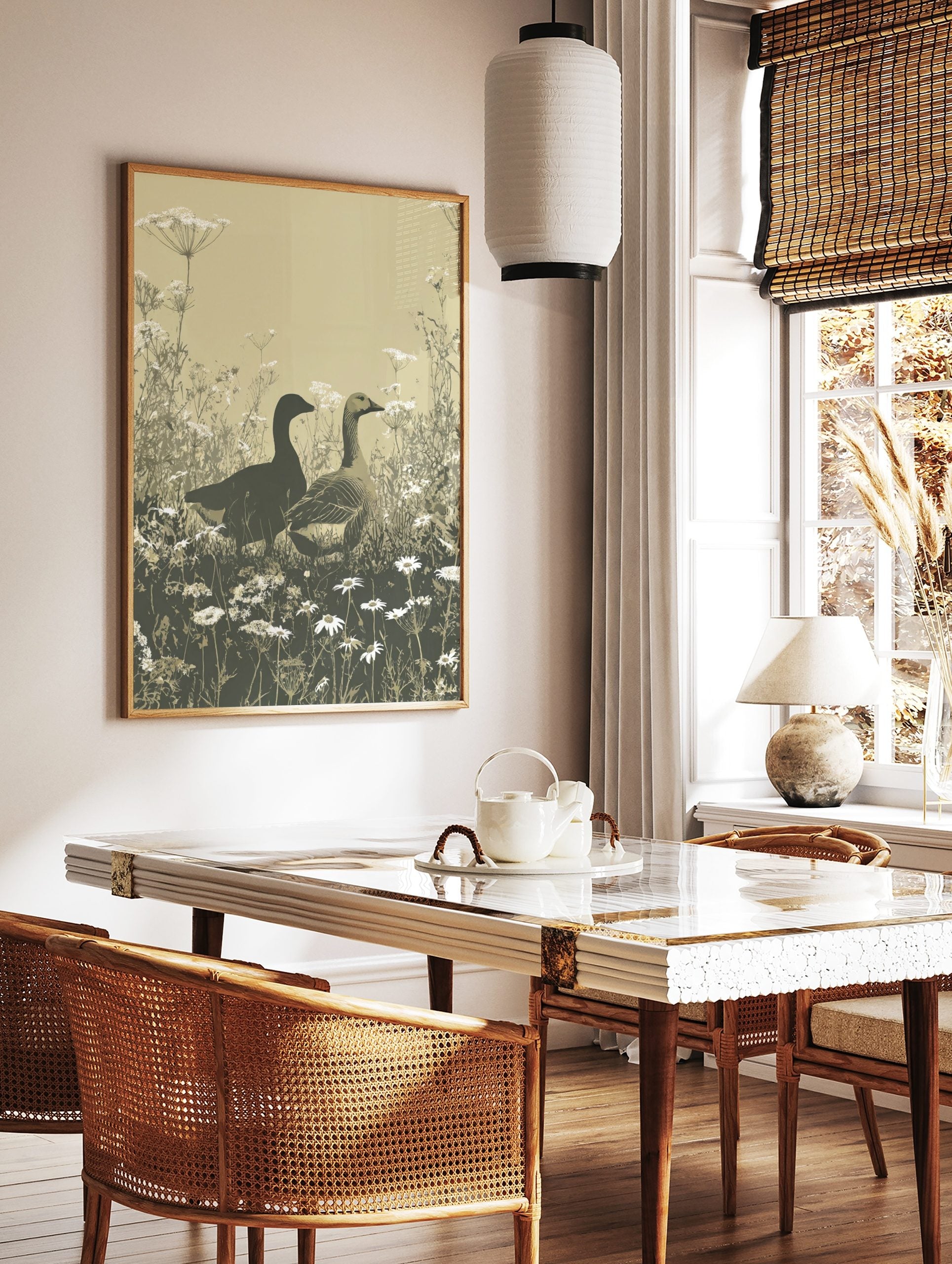 Illustrative print of two geese in a field of white cow parsley and daisies, earth tones, in a styled room mockup