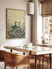 Illustrative print of two geese in a field of white cow parsley and daisies, earth tones, in a styled room mockup