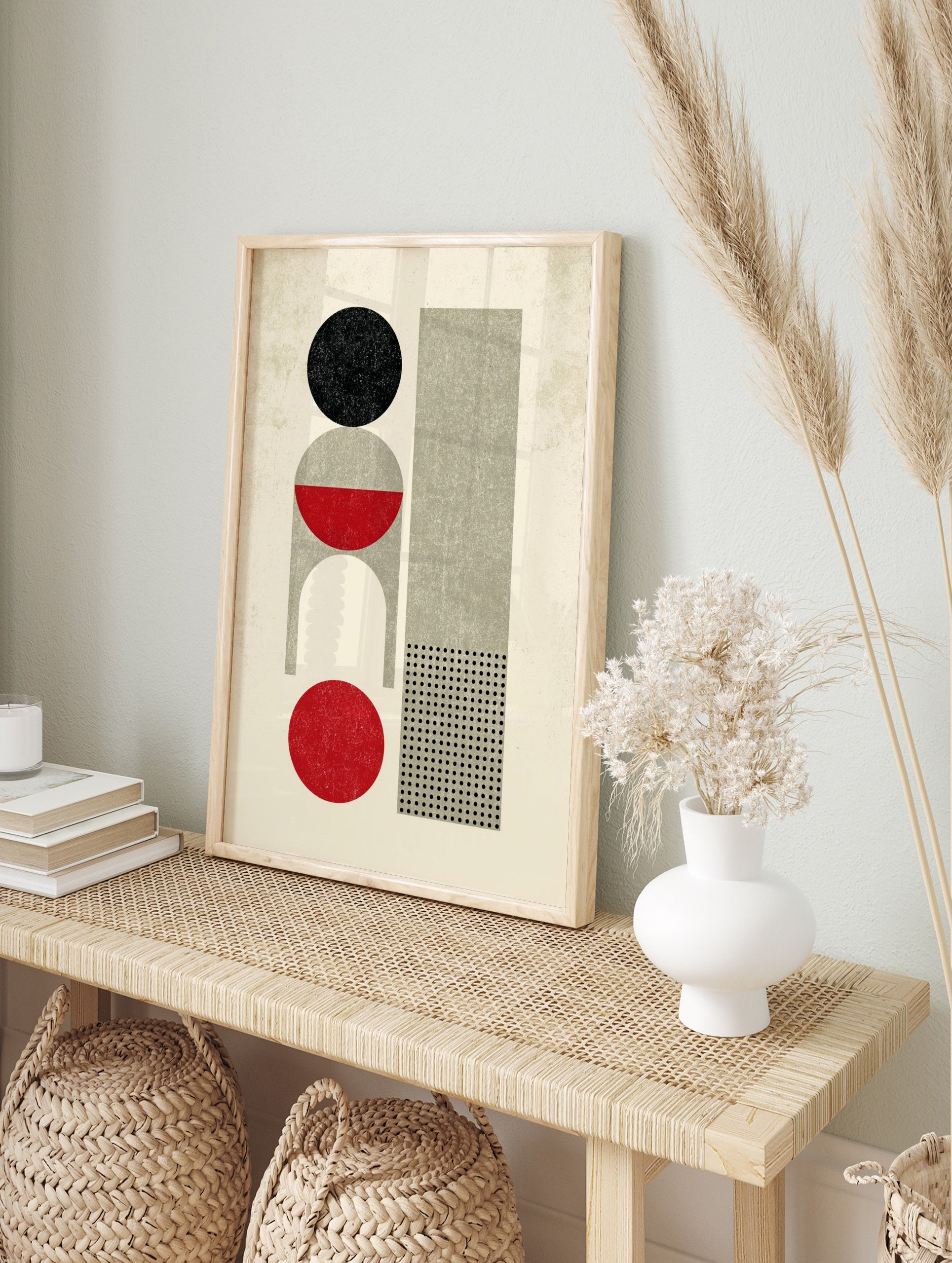 Geometric abstract art print featuring a distressed black circle, grey arch, red shapes, and, in an alternate framed mockup