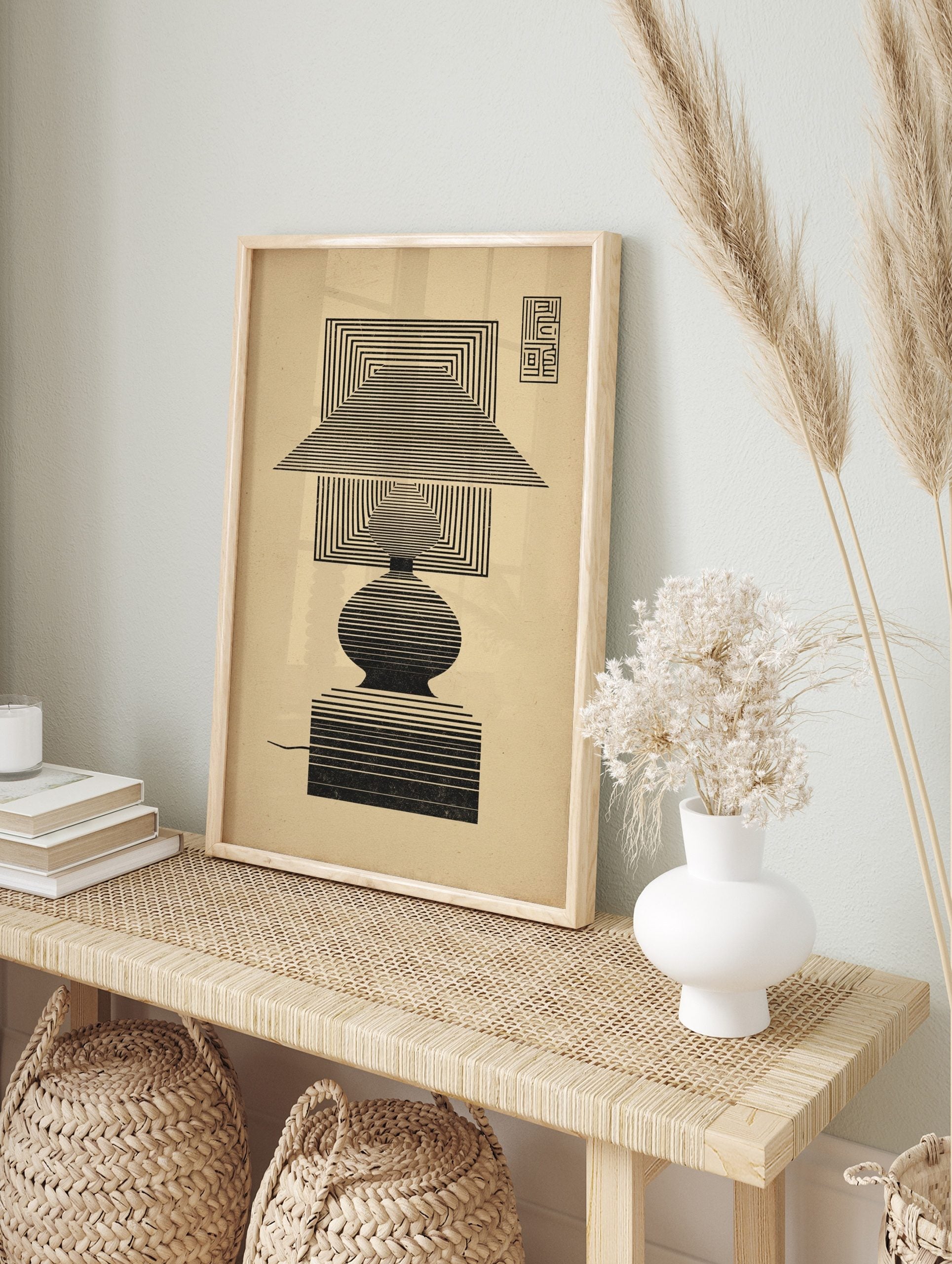 Geometric lamp illustration art print with concentric black lines on a beige background, Op, in an alternate framed mockup