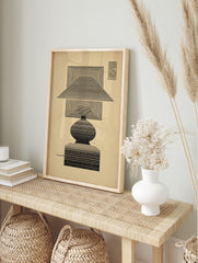 Geometric lamp illustration art print with concentric black lines on a beige background, Op, in an alternate framed mockup