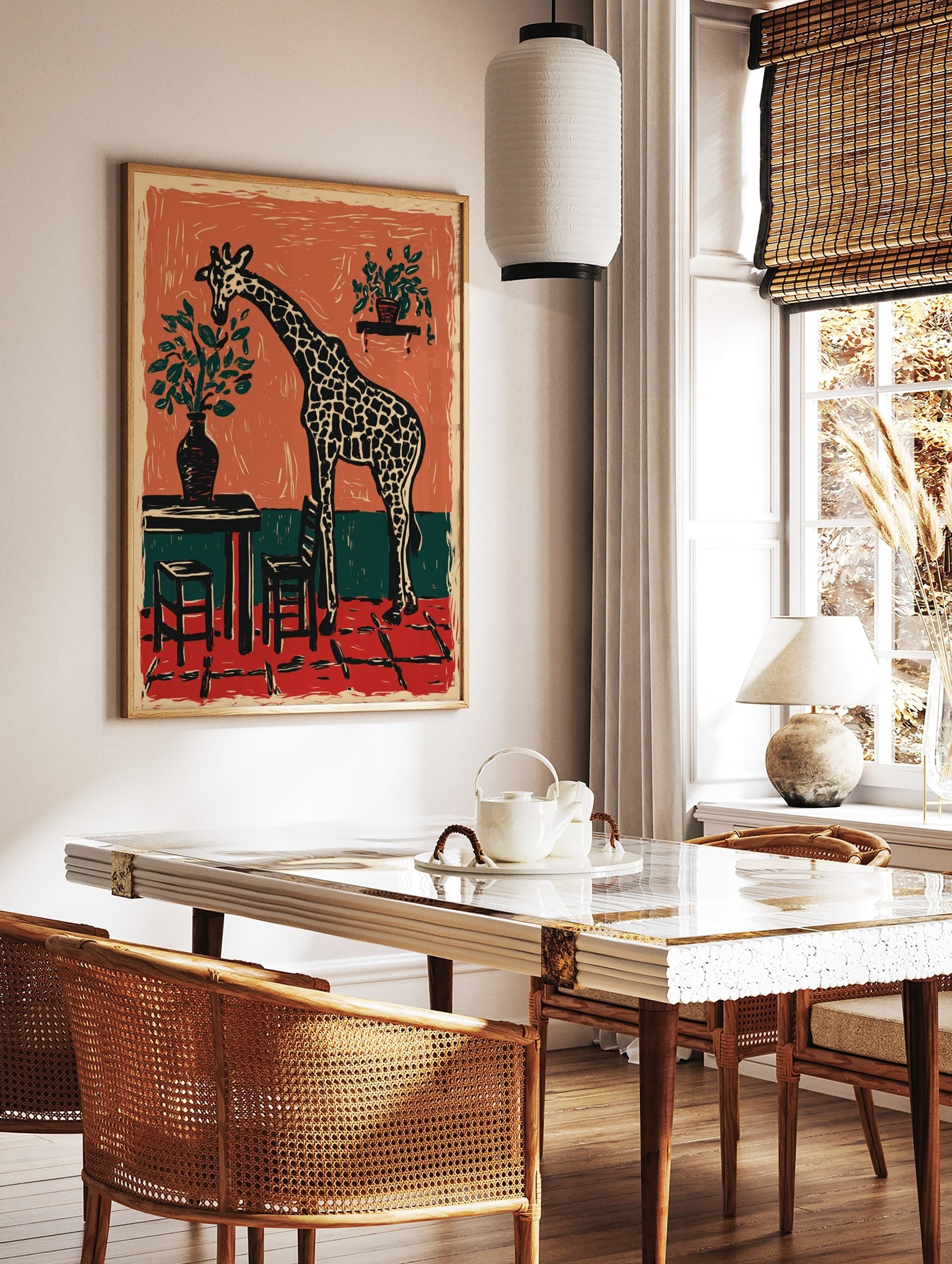 Woodcut style art print of a giraffe bending to eat leaves from a potted plant in a terracotta and, in a styled room mockup