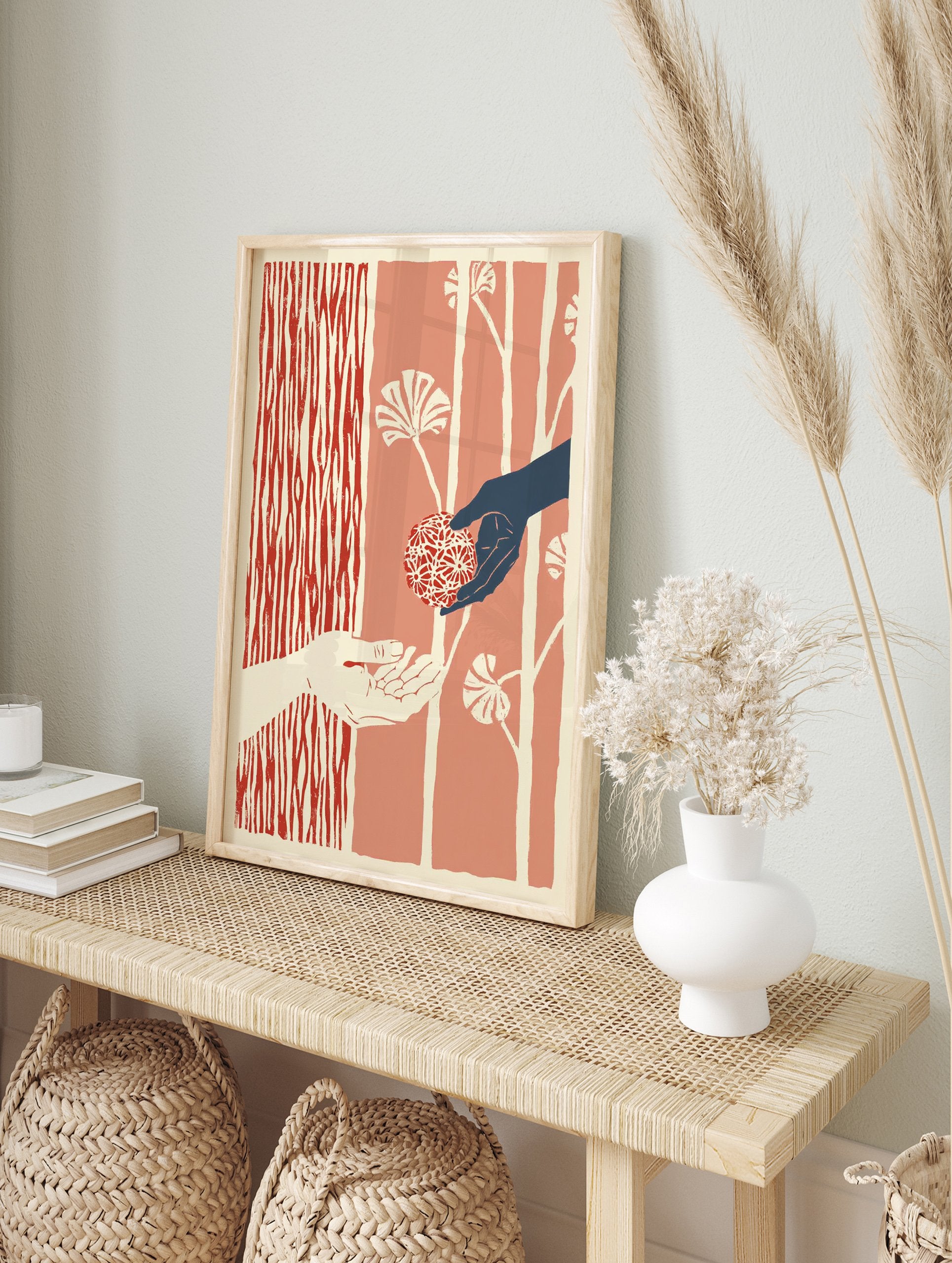Illustrative Giving Hands Wall Art with one dark hand offering a red patterned sphere to a light hand, against a red botanical background. - Image 3