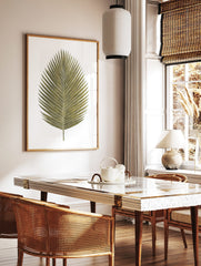 Gold palm leaf botanical illustration art print on a clean white background, tropical style, in a styled room mockup