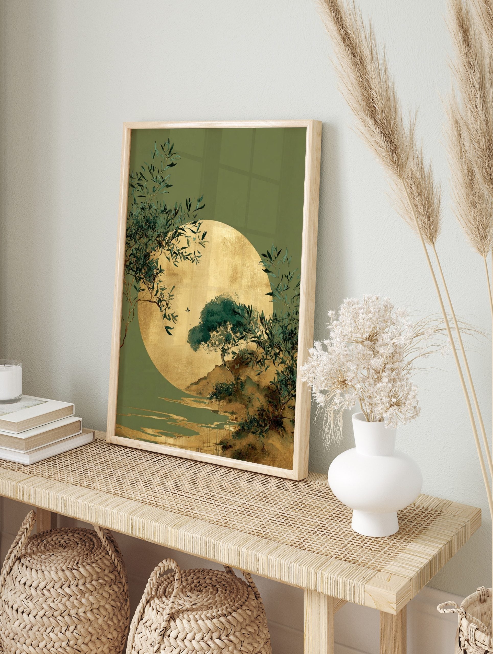 Golden sun or moon over a green landscape with trees, foliage, water, and a bird in flight, in an alternate framed mockup