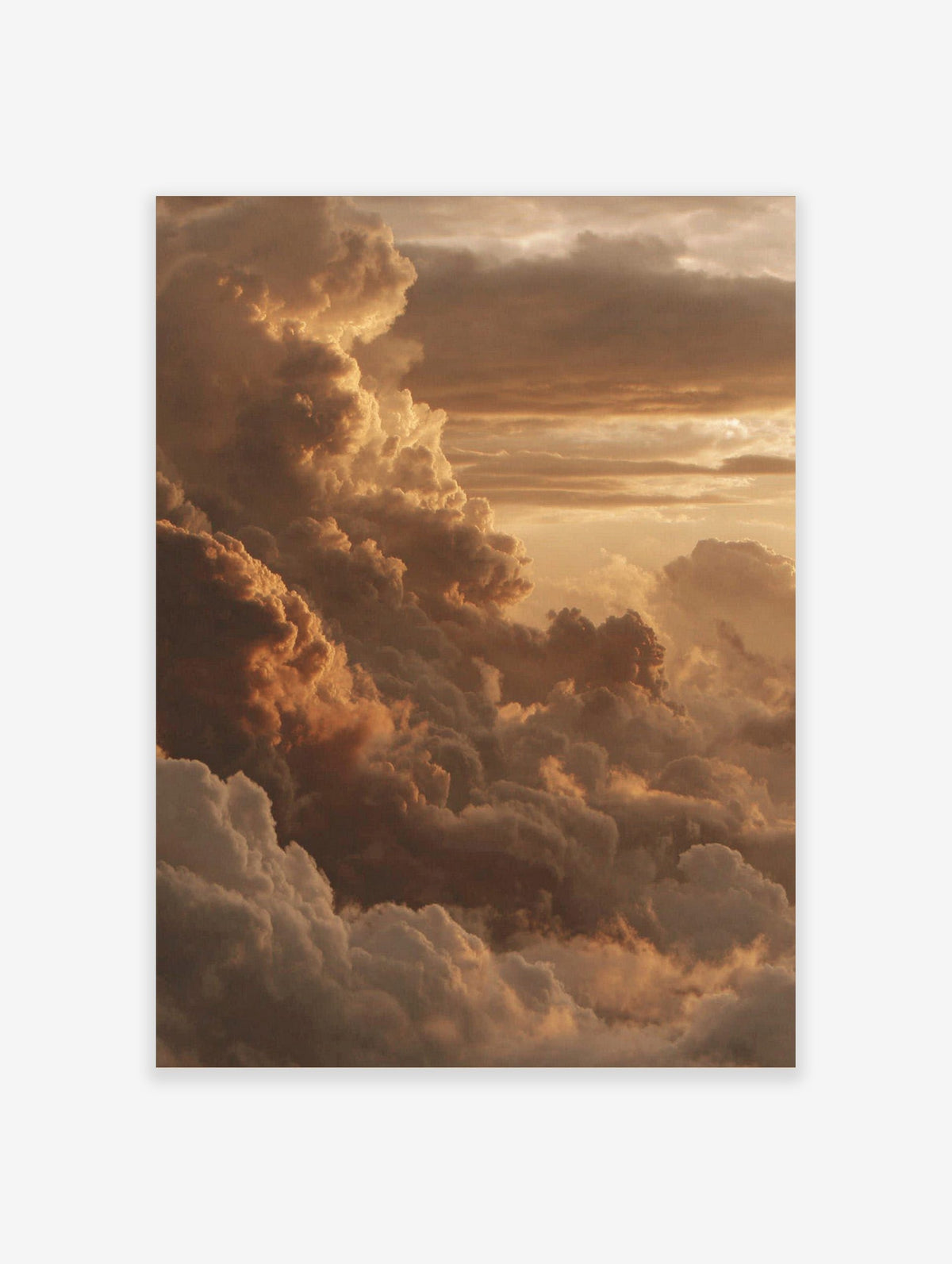 Dramatic golden sunset cloud formations in warm orange and brown hues, filling the sky