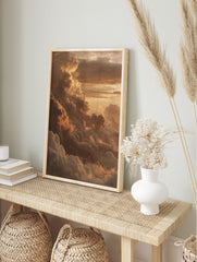 Dramatic golden sunset cloud formations in warm orange and brown hues, filling the sky, in an alternate framed mockup
