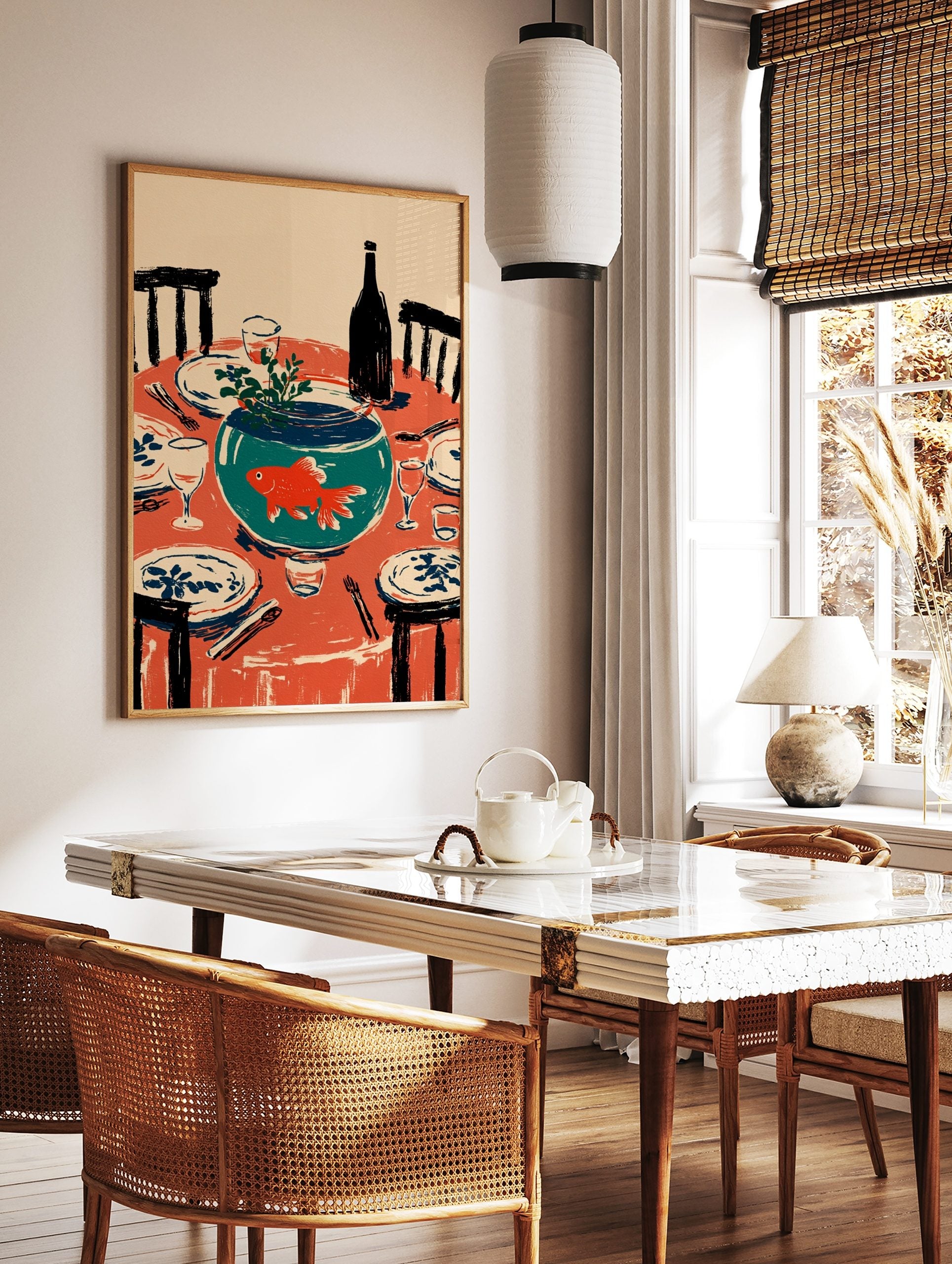 Illustrative wall art of an orange goldfish in a teal fishbowl on a red dining table set with, in a styled room mockup