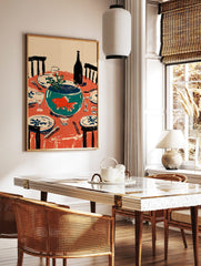 Illustrative wall art of an orange goldfish in a teal fishbowl on a red dining table set with, in a styled room mockup