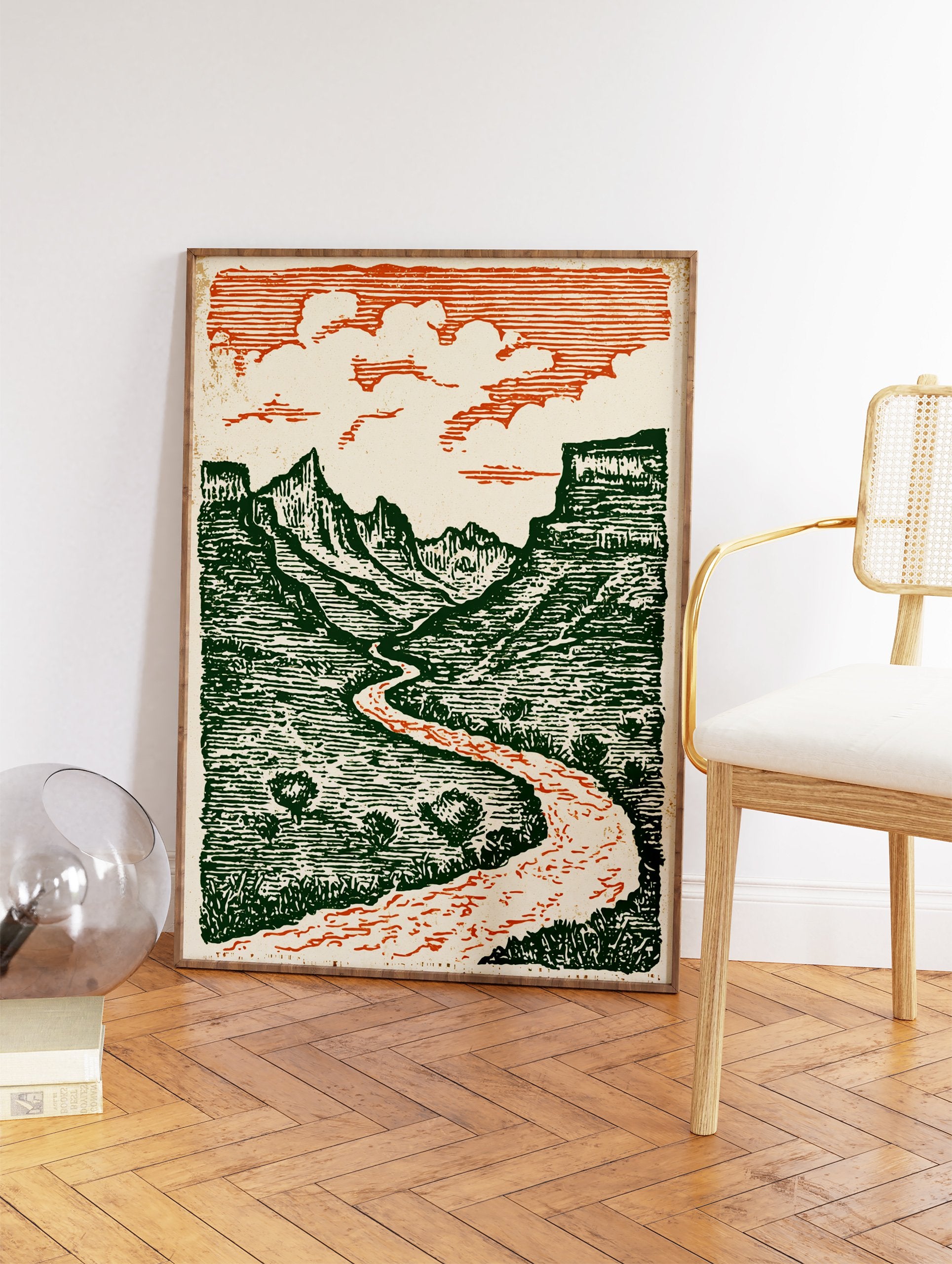 Illustrated Grand Canyon landscape wall art print featuring green mountains, a reddish-orange winding river, and clouds. - Image 2