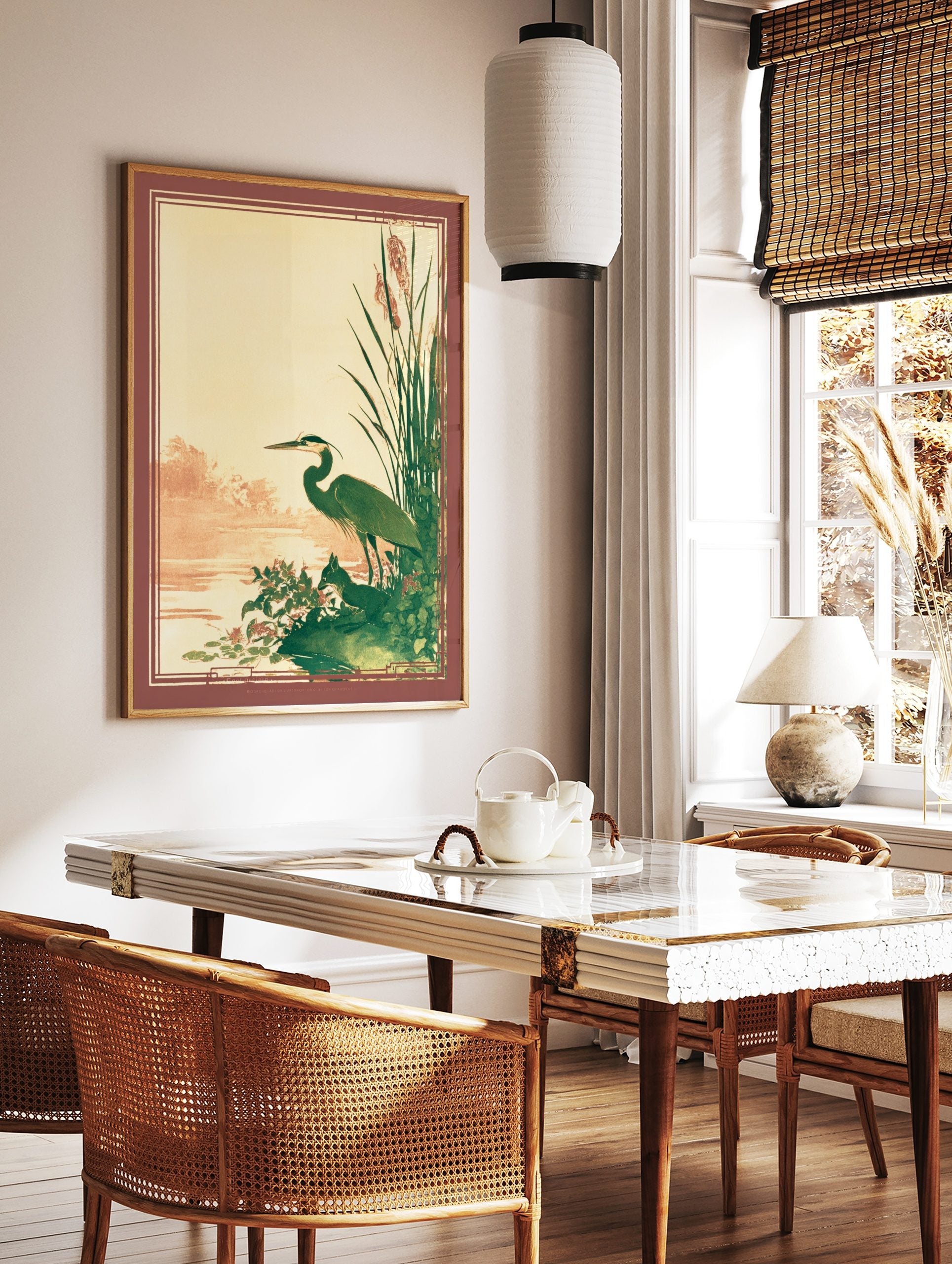 Illustrative great blue heron and fox by a pond with reeds, in green, brown, and beige tones, in a styled room mockup
