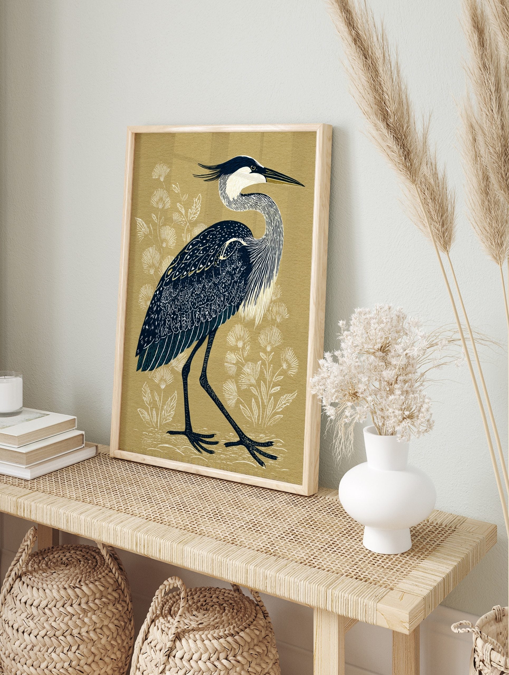 Great Blue Heron bird illustration with navy blue feathers and white neck on a beige, in an alternate framed mockup