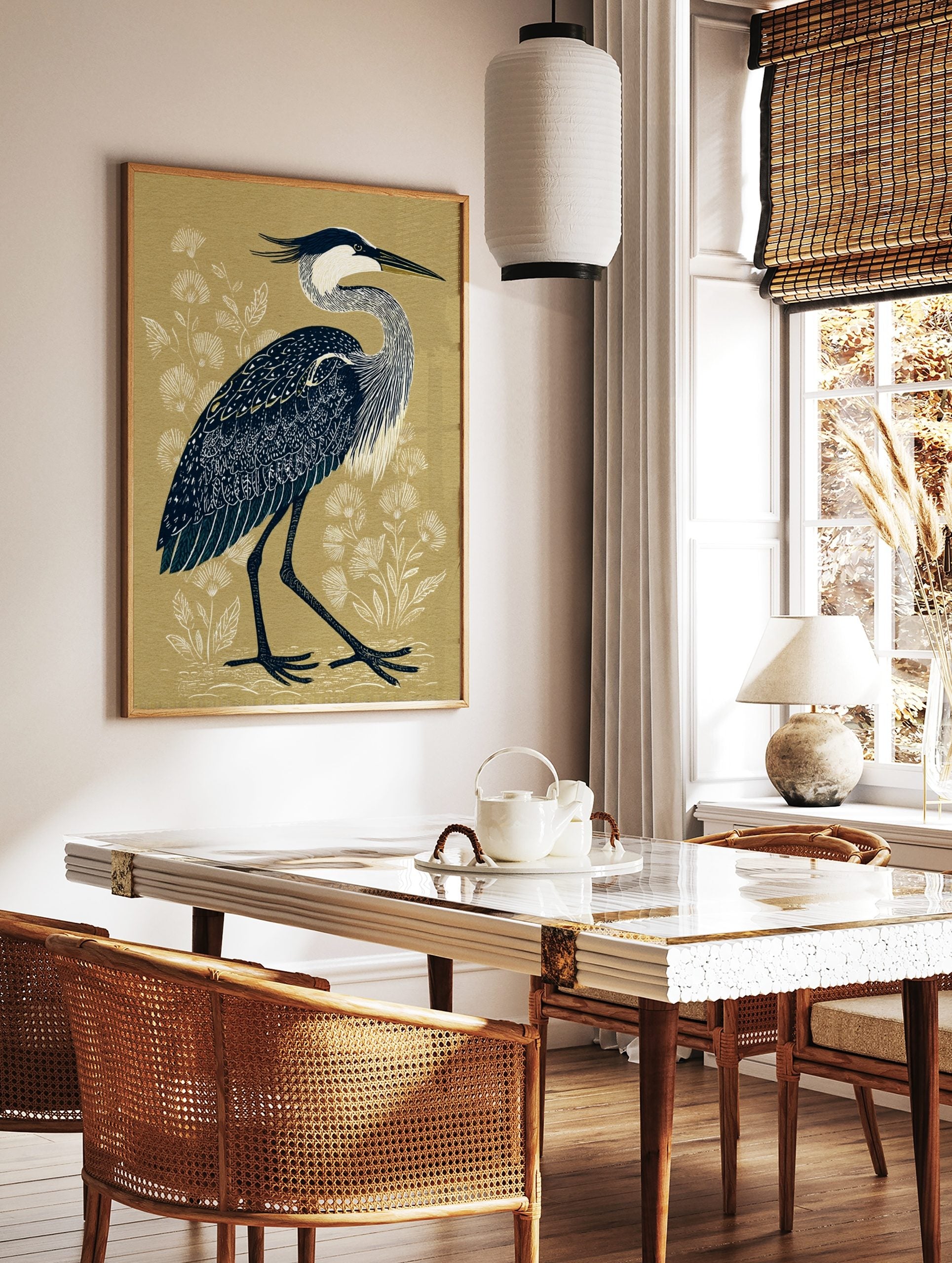 Great Blue Heron bird illustration with navy blue feathers and white neck on a beige background, in a styled room mockup