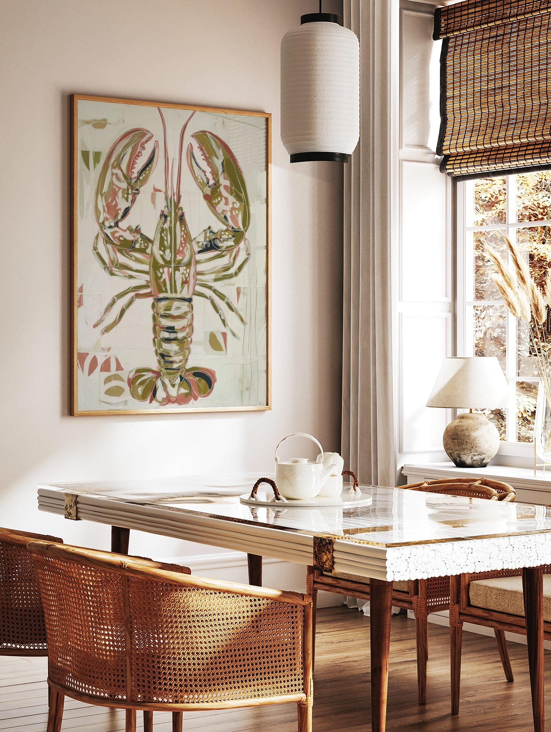 Illustrative lobster art print in olive green, reddish-pink, and white on a textured off-white, in a styled room mockup