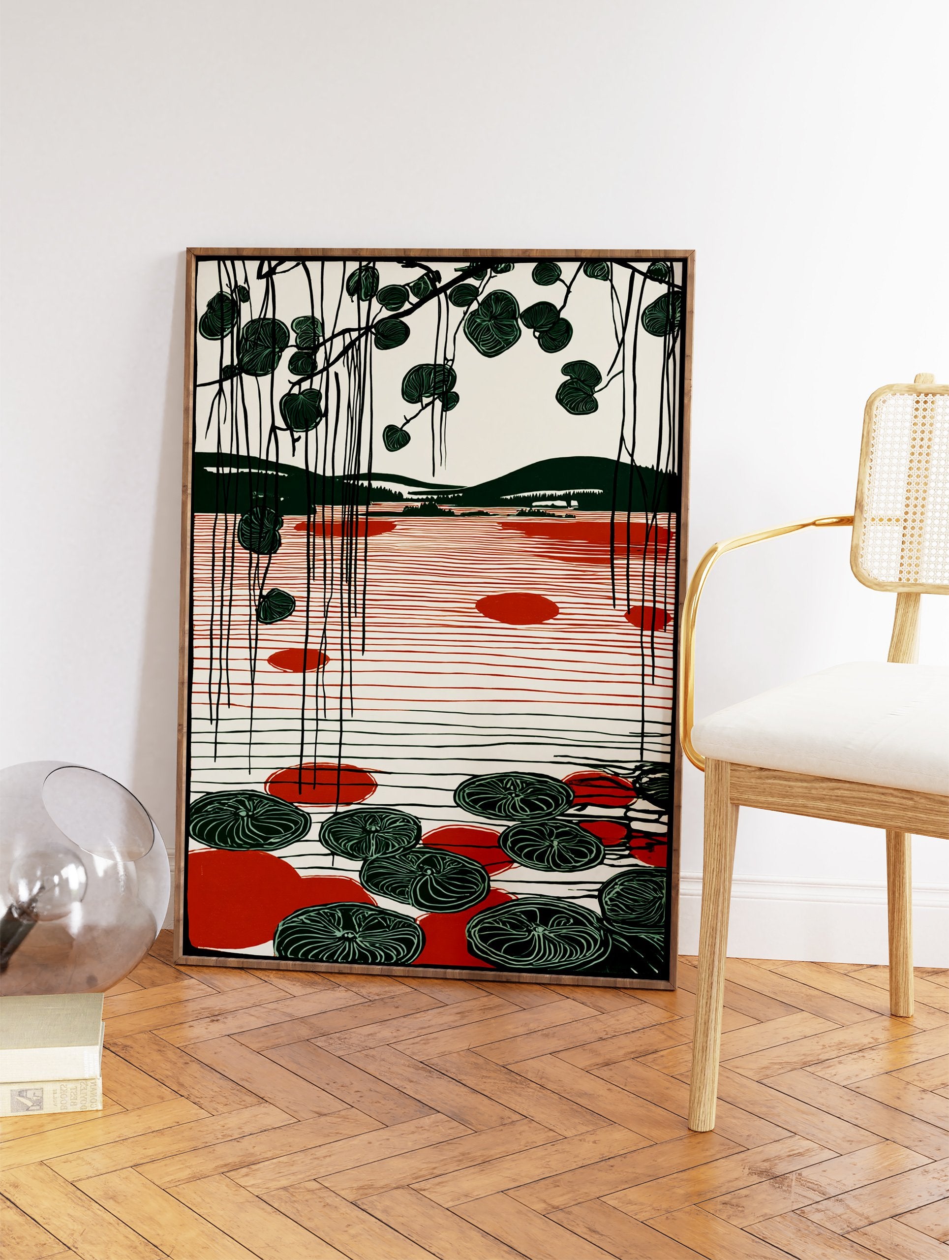 Modern green and red lake art print with hanging botanical leaves and lily pads on a minimalist landscape. - Image 2