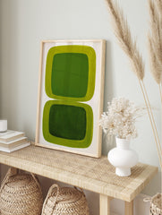 Green abstract wall art with two stacked rounded rectangular shapes, lime green borders and, in an alternate framed mockup