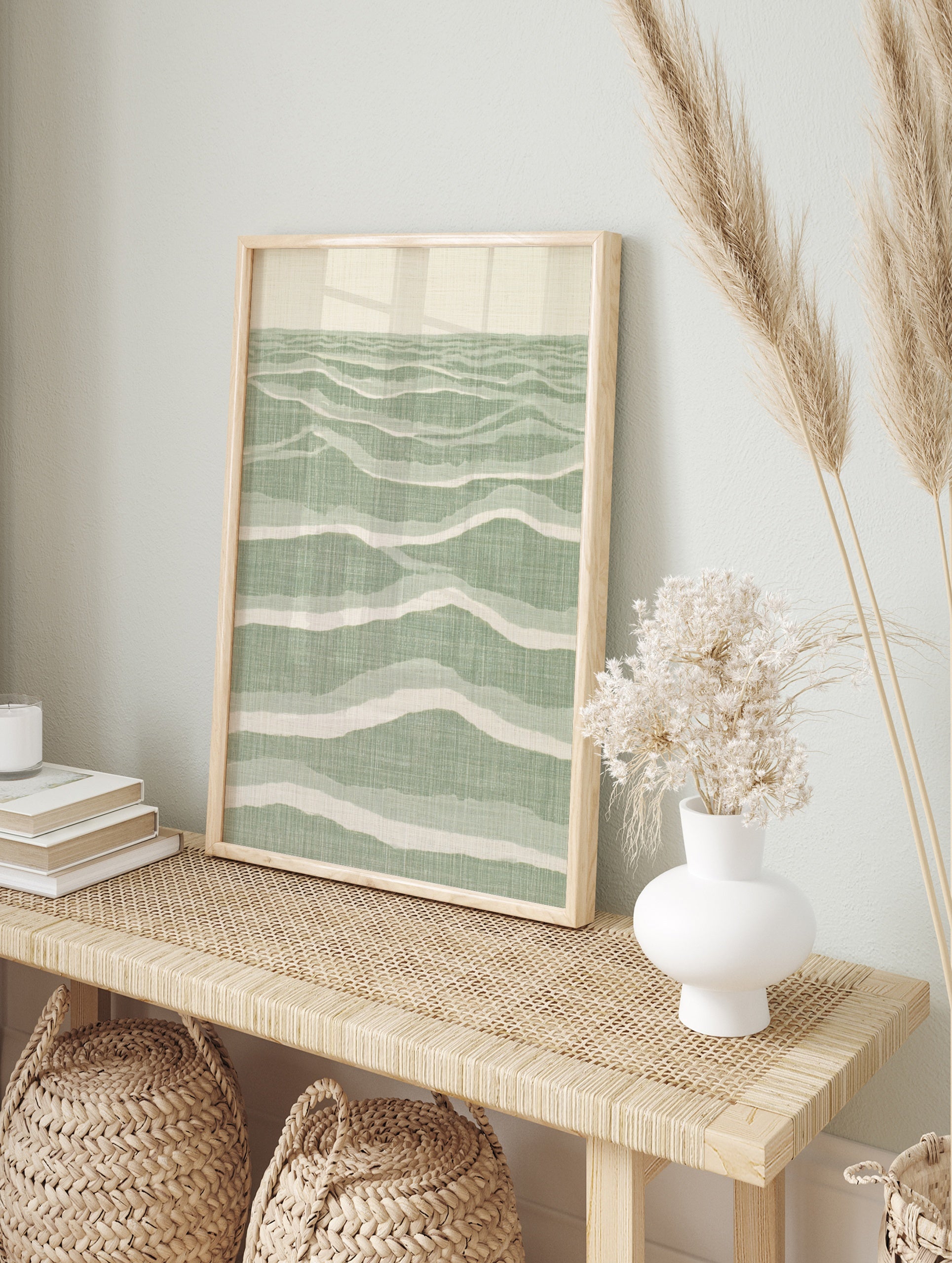 Abstract wave pattern wall art with layered sage green and cream lines on satin paper, in an alternate framed mockup