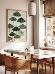 Stylised green botanical fan shapes with radiating lines on a cream background, abstract nature art, in a styled room mockup