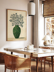 Green botanical wall art print of a vase with leafy branches on a textured light background, with a subtle shadow. - Image 3