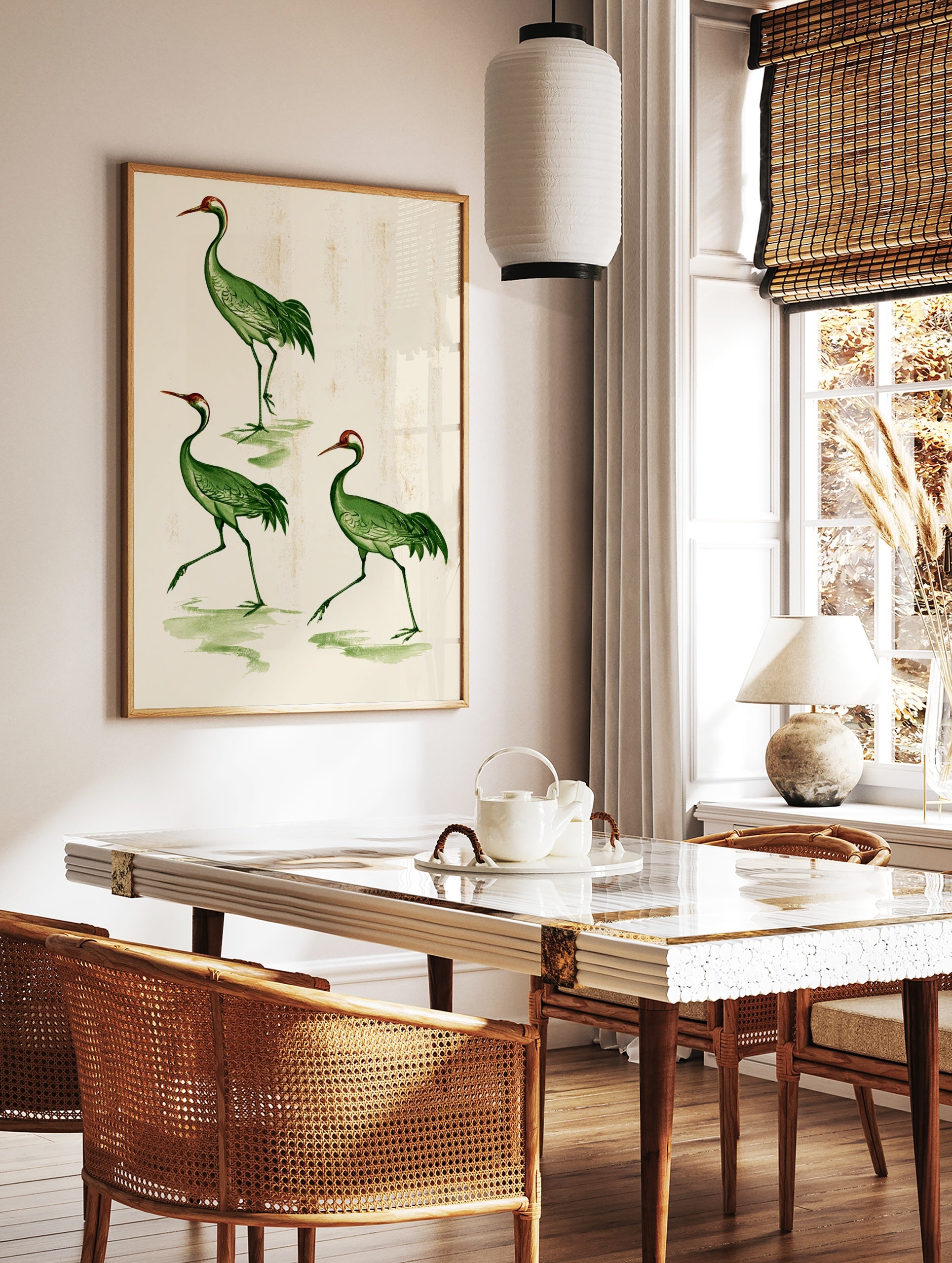 Vintage style illustration of three green cranes with red crowns on a textured cream background, in a styled room mockup
