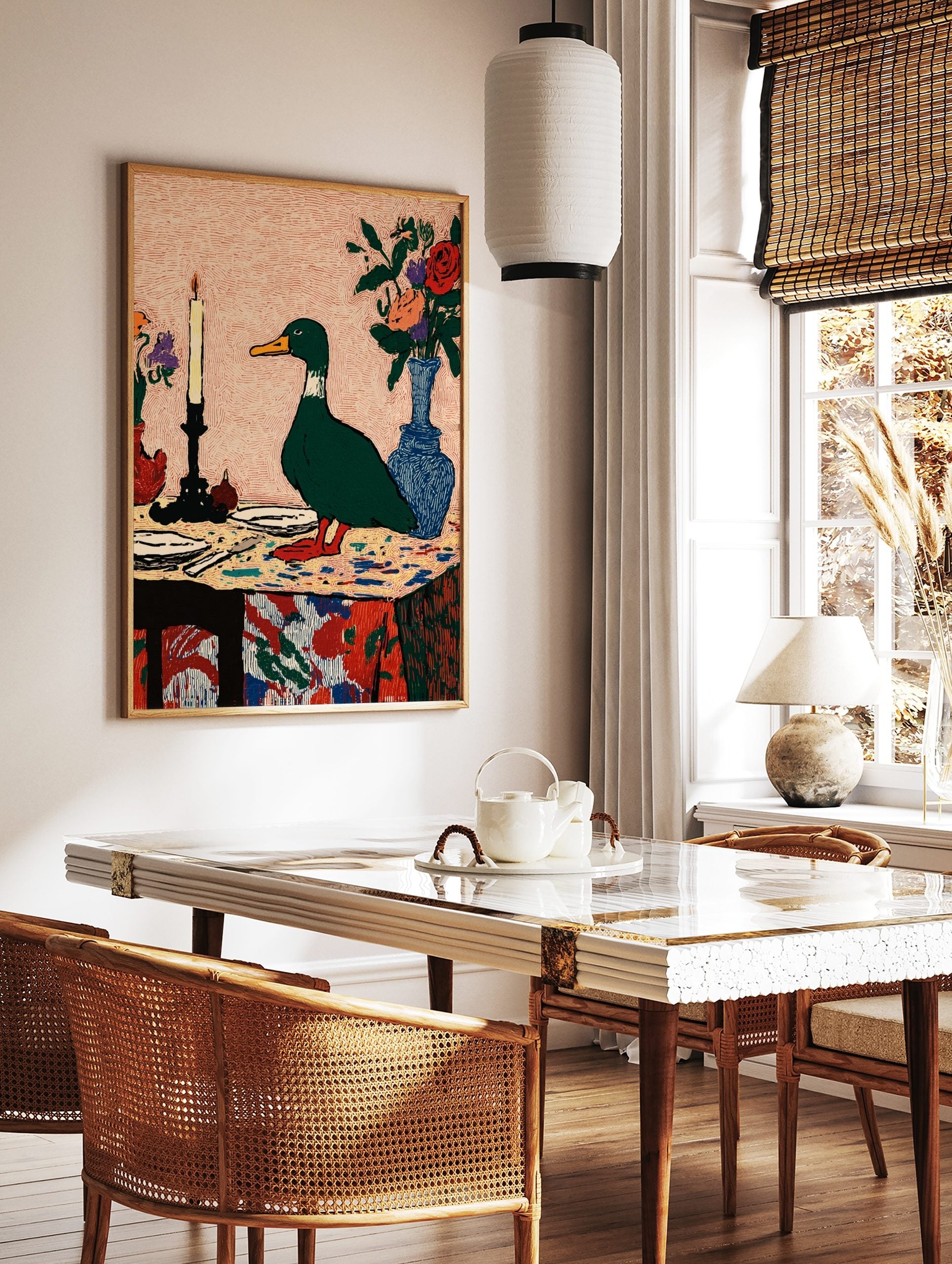 Illustrative green duck standing on a colourful table with a lit candle and flower vases, in a styled room mockup