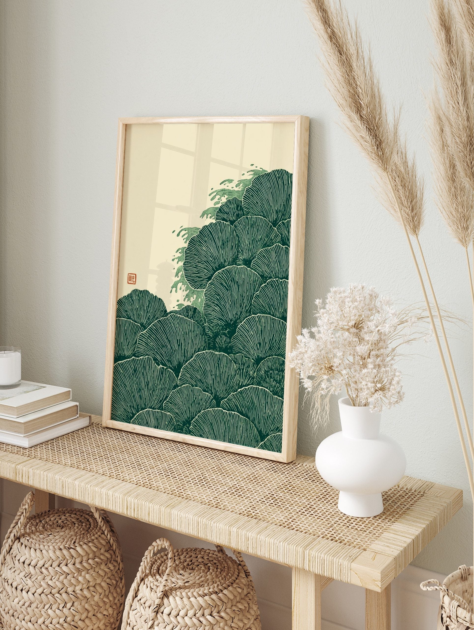 Green fan-shaped leaves or fungi with wave-like splashes in a Japanese woodcut art print style, in an alternate framed mockup