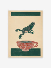 Green frog leaping over a red patterned teacup on a beige background with green stripes. Frog art print.