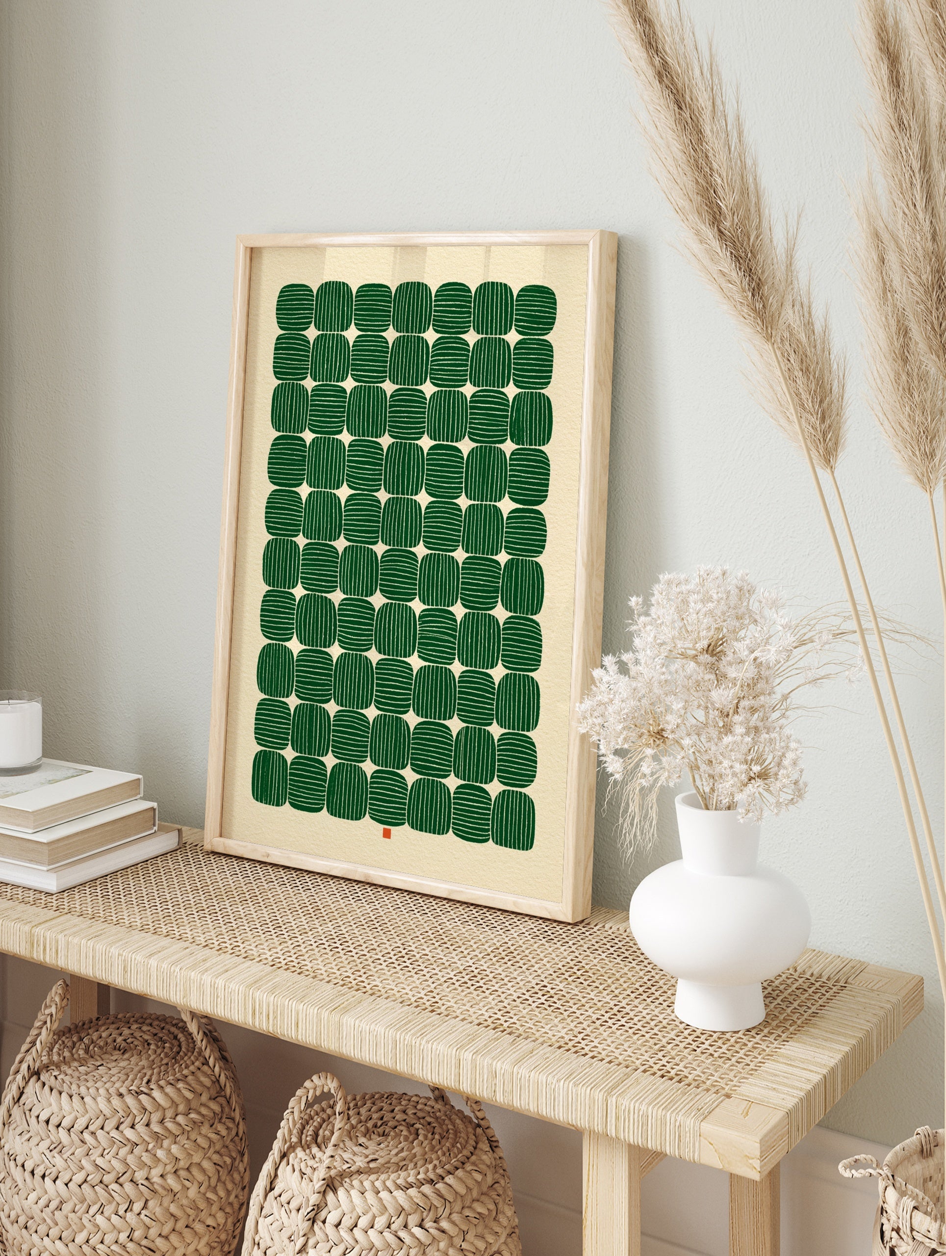 Geometric abstract wall art with green striped rounded shapes in a grid pattern on a cream, in an alternate framed mockup