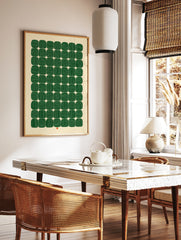 Geometric abstract wall art with green striped rounded shapes in a grid pattern on a cream, in a styled room mockup