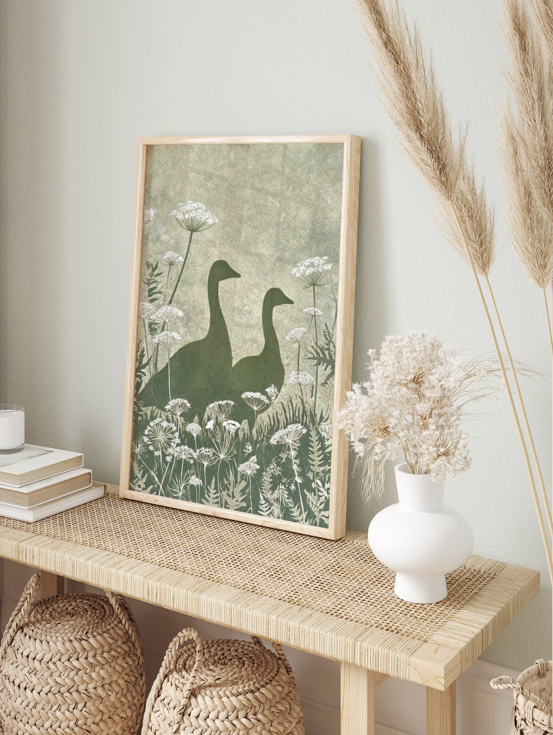 Illustrative green goose silhouettes with white Queen Anne's Lace botanical print, in an alternate framed mockup