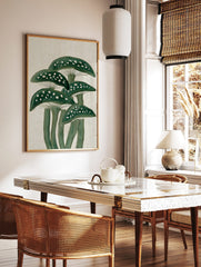 Illustrative green mushrooms with white spots and gills on a textured beige background, vertical, in a styled room mockup