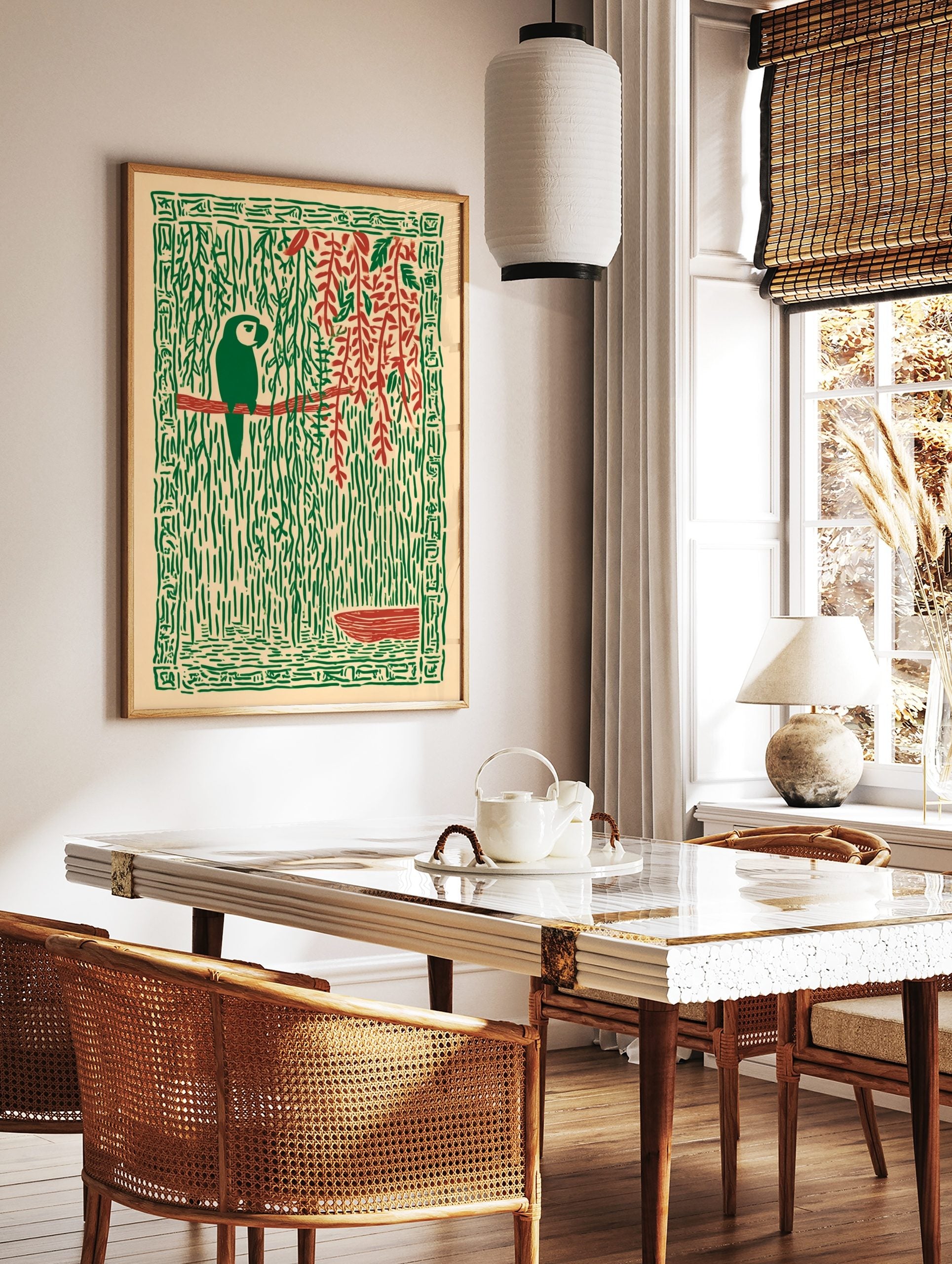 Stylised green parrot on red branch, surrounded by green jungle vines, red leaves, and a patterned, in a styled room mockup