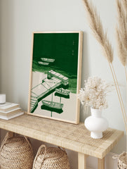 Green and off-white illustration of boats moored to a stone pier on calm water, with Chinese, in an alternate framed mockup